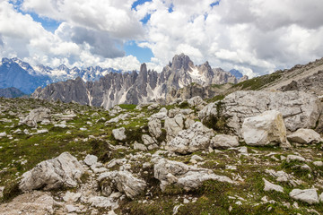 clouds over mountain trail in Dolomites