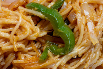 Delicious Noodles closeup, chinese food fried noodles.