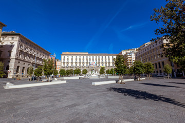 Fototapeta na wymiar City Hall Square with the famous Neptune fountain on Piazza Municipio in Naples, Italy.
