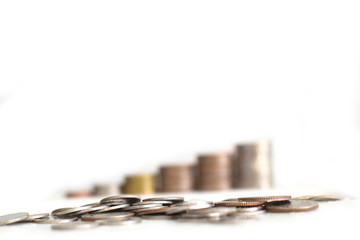 Columns of coins, piles of coins on white background, business banking and financial concept idea.