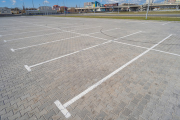 Open space with road signs and road markings, road intersections, pedestrian crossings, sunny day, blue sky, city landscape background