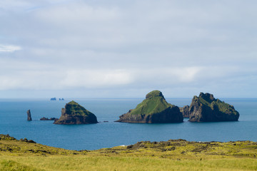 Fototapeta premium Westman Islands beach day view, Iceland landscape.Smaeyjar islands