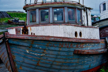 Fototapeta na wymiar old fishing boat in harbor