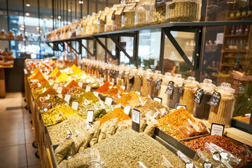 Table full of delicious spices in a Shopping Mall in Paris in France