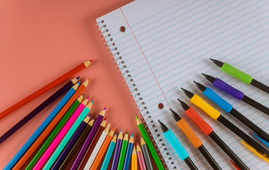 Back to school concept school office supplies on a with copy space of papers, pencils, markers and notepads