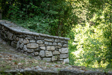 Mountain trail with stone handmade walls