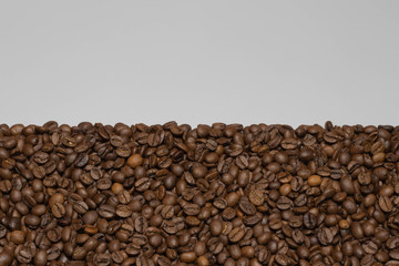coffee beans are beautifully laid on the surface