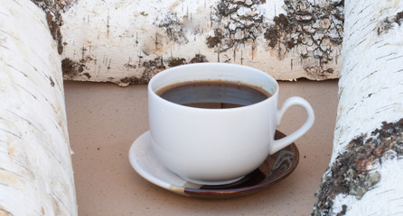 black coffee on birch wood