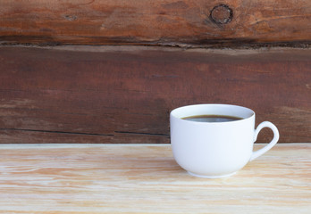  black coffee on wooden background