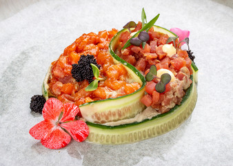 Salmon and tuna tartar with tobiko caviar.