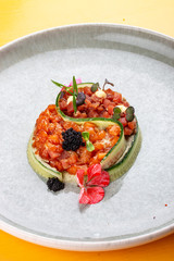 Salmon and tuna tartar with tobiko caviar.