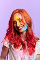 laughing attractive girl enjoying the festival in india. close up portrait, isolated white background, studio shot