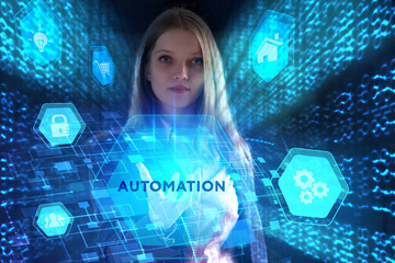 The concept of business, technology, the Internet and the network. A young entrepreneur working on a virtual screen of the future and sees the inscription: Automation