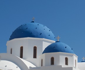 Iconic blue domed church on Santorini Greece