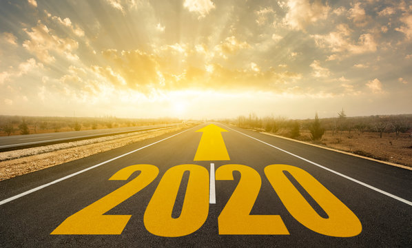 The word 2020 written on highway road. Concept for new year 2020.