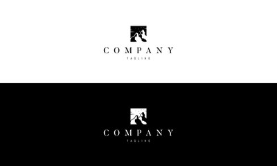 Vector logo on which the image of two mountains with snow.
