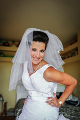 Morning preparations of bride in wedding dress before the wedding - 280883157