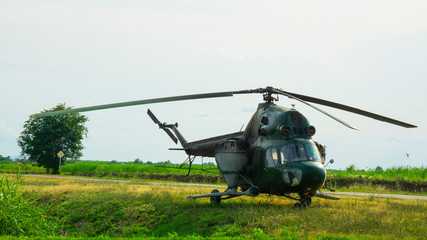 A helicopter equipped with equipment for spraying chemicals