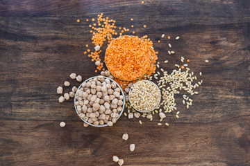  bowls of dried vegetables: chickpeas, red lentils, soy