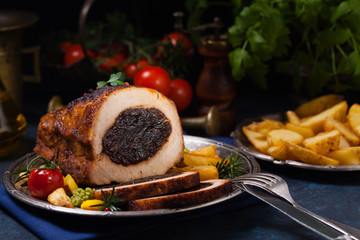 Whole roasted pork loin stuffed with dried plum