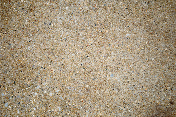 Concrete texture closeup with visible pebbles