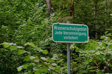 Sign in forest: "Water reserve - any pollution prohibited"
