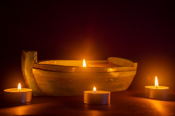 miniature boat and candles colse up