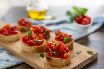 italian bruschette with basil and cherry tomatoes