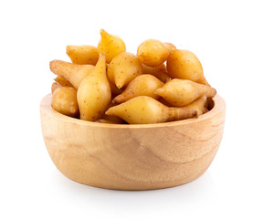 finger root (Krachai) Thai herb in wood bowl isolated on white background