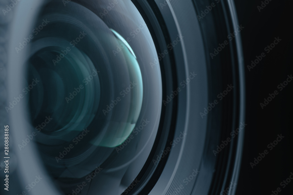 Poster close up beautiful camera lens of black background. macro view..