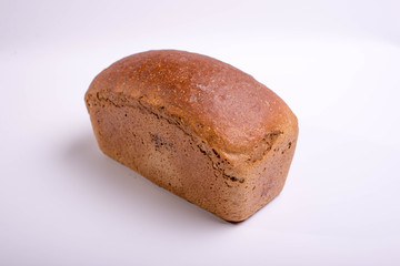 Gray bread on a white background. Baking for food