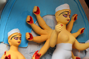 Idol of Hindu Goddess Durga during preparations in Kolkata. Clay idol of Goddess Durga, under preparation for Bengal's Durga Puja festival at Kumartuli Kolkata. Durga Puja is biggest festival in India