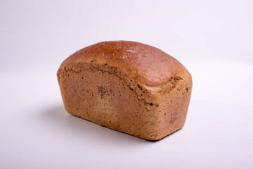 Gray bread on a white background. Baking for food