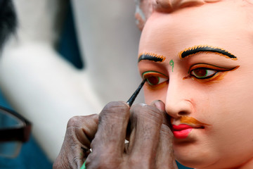 Clay idol of God Kartik, under preparation for Bengal's Durga Puja festival at Kumartuli Kolkata....