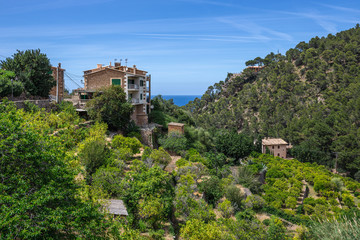 Fototapeta na wymiar Spanish village in Sierra de Tramuntana mountains on Mallorca island