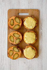 Cooking cheeseburger step-by-step, top view. Overhead, from above, flat lay. Close-up.