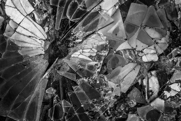 Broken Glass isolated on black background, black and white