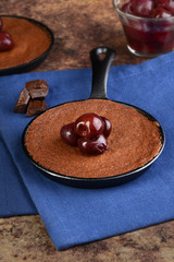 dessert pan with brownie and bing cherries