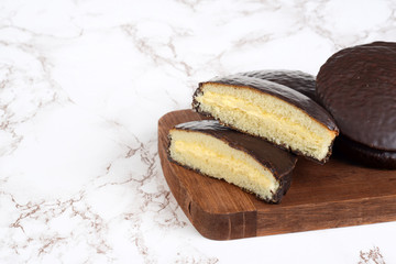 custard cream filled chocolate sponge cake