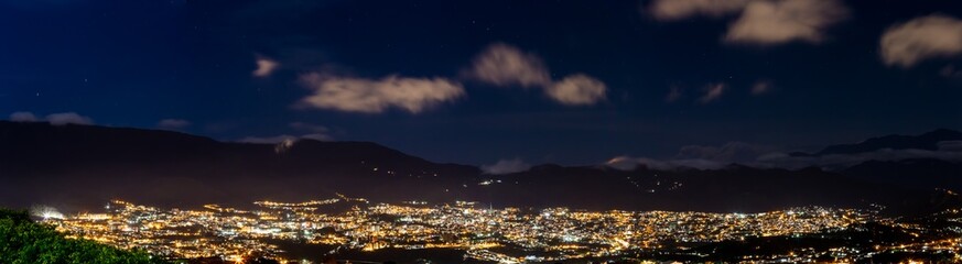 City panorama at night made with several pictures put together in software. This is San Cristobal...