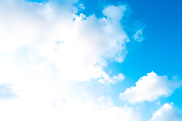 Nature Bright blue Sky with white clouds on blackground. Beautiful sky and clouds in the afternoon.