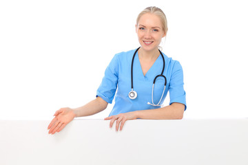 Doctor woman or nurse isolated over white background. Cheerful smiling medical staff representative. Medicine concept