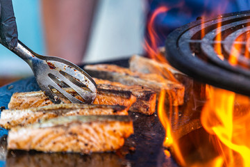 The chef prepares delicious fillet of salmon. Closeup of a fresh fillet of salmon