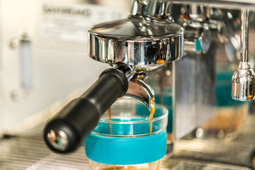 Coffee with various options.Espresso machine making coffee in cup. Brewing coffee with espresso machine