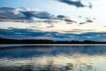 Sunset on the shores of the calm Saimaa lake in the Kolovesi National Park in Finland - 3