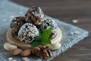 Energy Balls for snack on a wooden plate