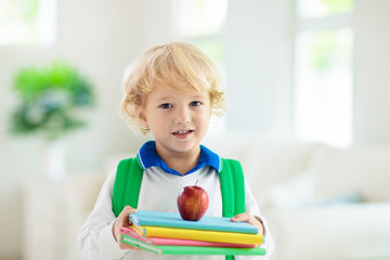 Child going back to school. Kid with backpack.