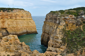 Cliff view and Atlantic ocean in Lagoa. Algarve, Portugal