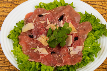 Beef carpaccio with parmesan cheese