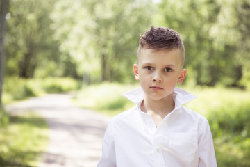 Young photo model posing, boy fashion portrait